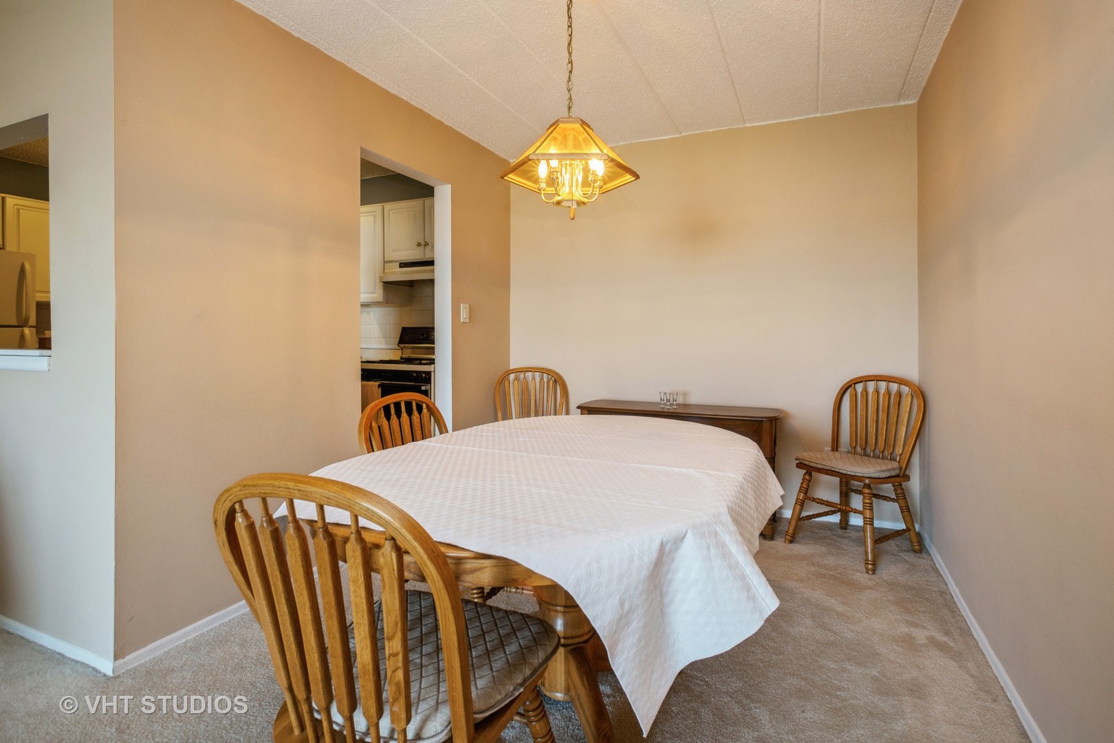 110 West Butterfield Road, Unit 509S Elmhurst, IL 60126 - Photo 6 of 14 a bedroom with a bed and a chair