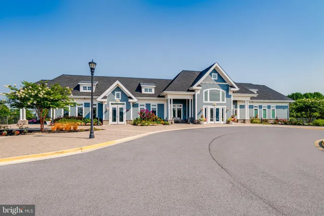 a patio with a patio table and chairs
