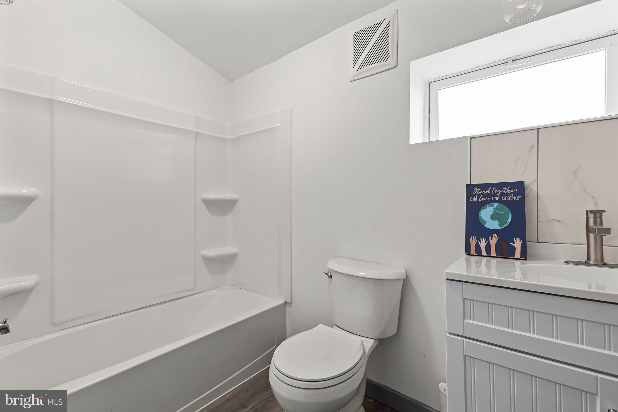 780 White Hall Road Littlestown, PA 17340 - Photo 11 of 36 a bathroom with a toilet a sink and a bathtub