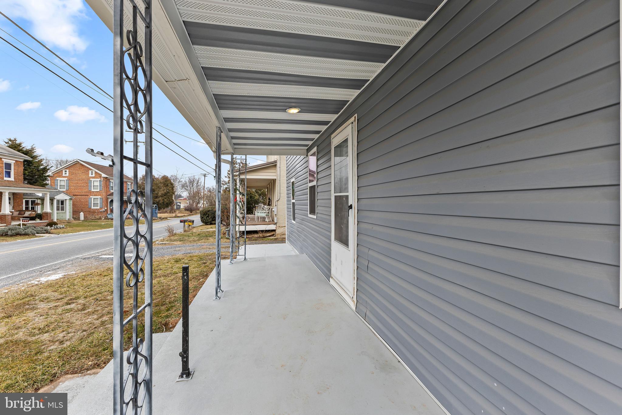 780 White Hall Road Littlestown, PA 17340 - Photo 30 of 36 a view of a balcony with chairs