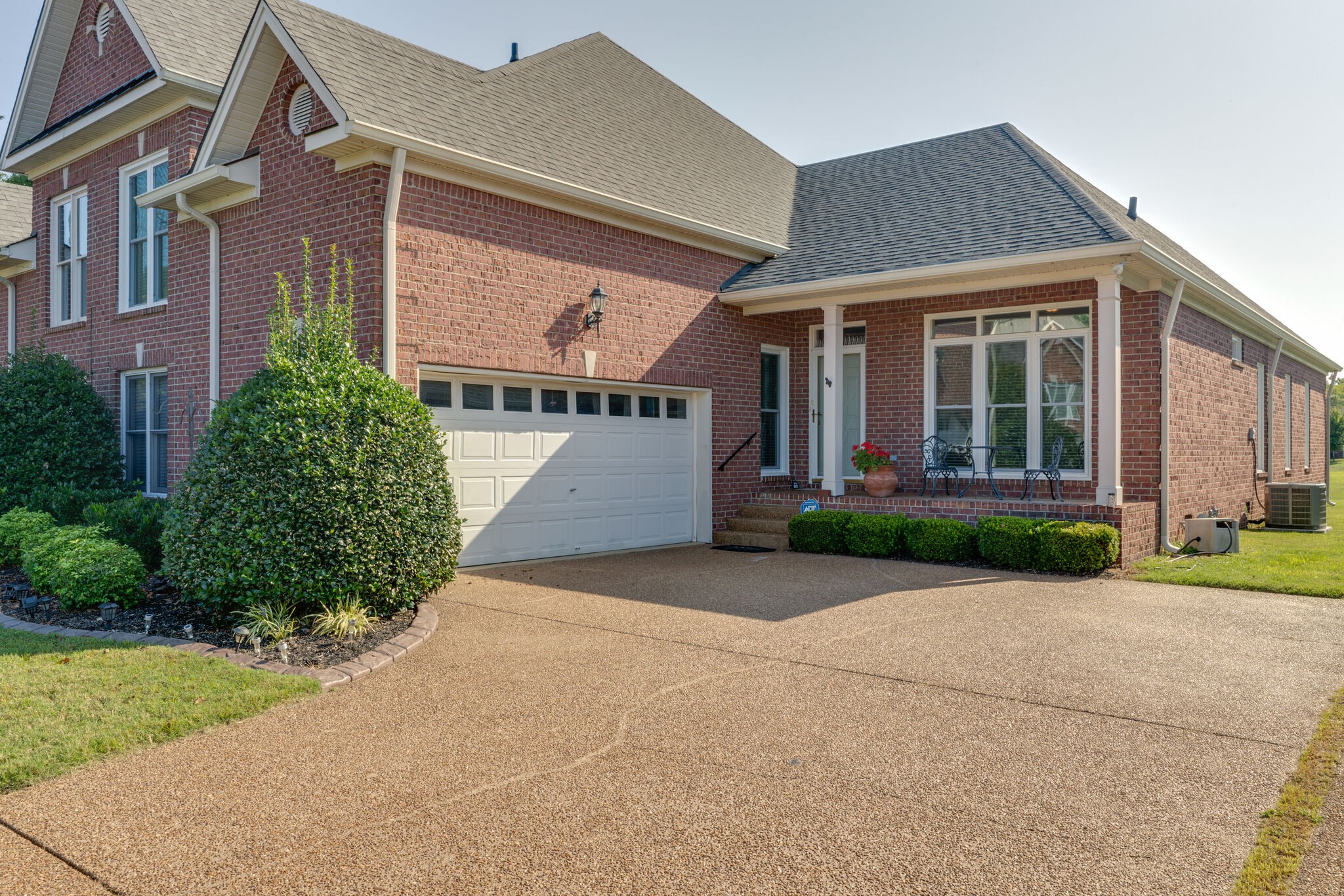 164 Stoners Glen Road Hermitage, TN 37076 - Photo 2 of 37 front view of a house with a yard and potted plants