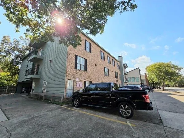 a car parked in front of a house