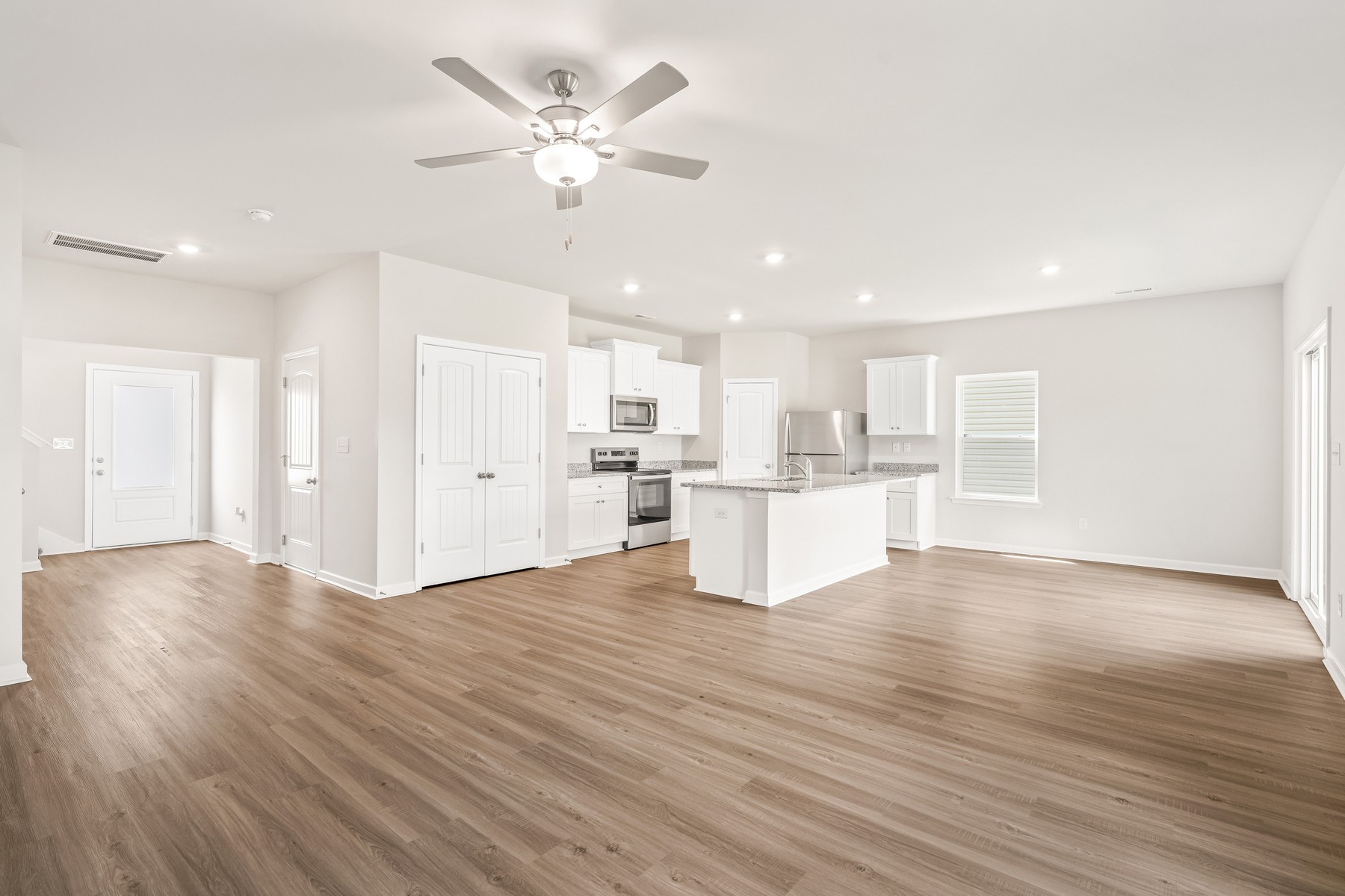 2007 Lala Loop White Bluff, TN 37187 - Photo 3 of 15 a view of kitchen with wooden floor and window