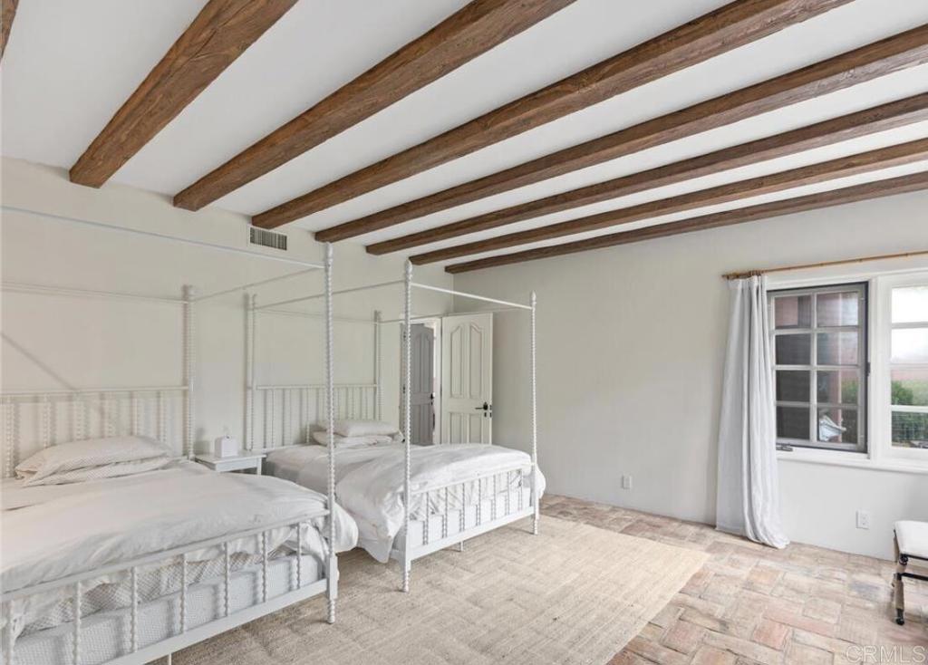 17116 Paseo Hermosa Rancho Santa Fe, CA 92067 - Photo 14 of 28 a bedroom with bed and a window
