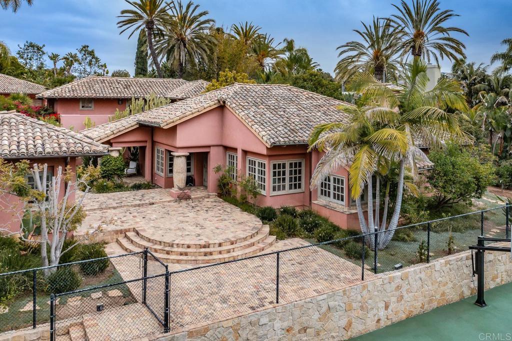 17116 Paseo Hermosa Rancho Santa Fe, CA 92067 - Photo 19 of 28 a front view of a house with garden