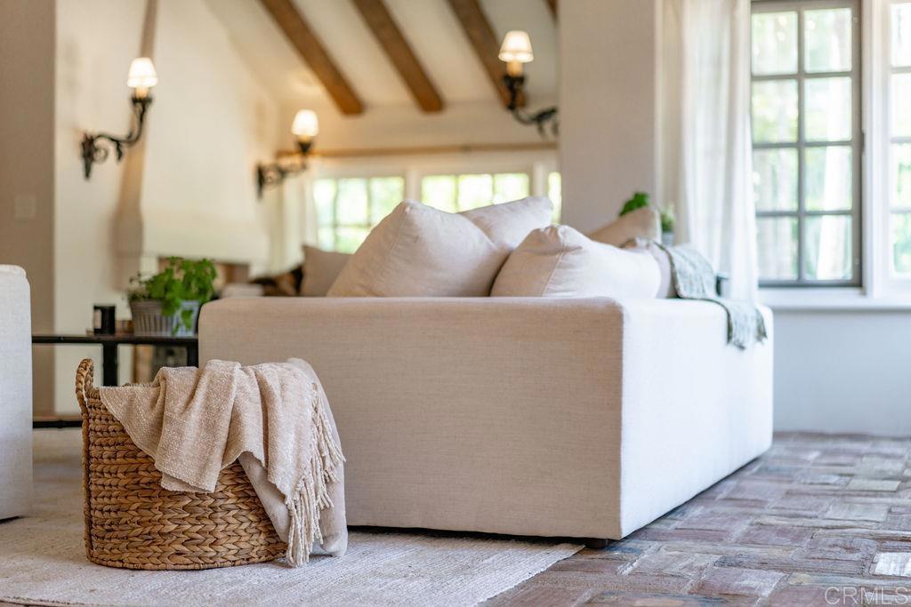 17116 Paseo Hermosa Rancho Santa Fe, CA 92067 - Photo 5 of 28 a living room with furniture and a large window
