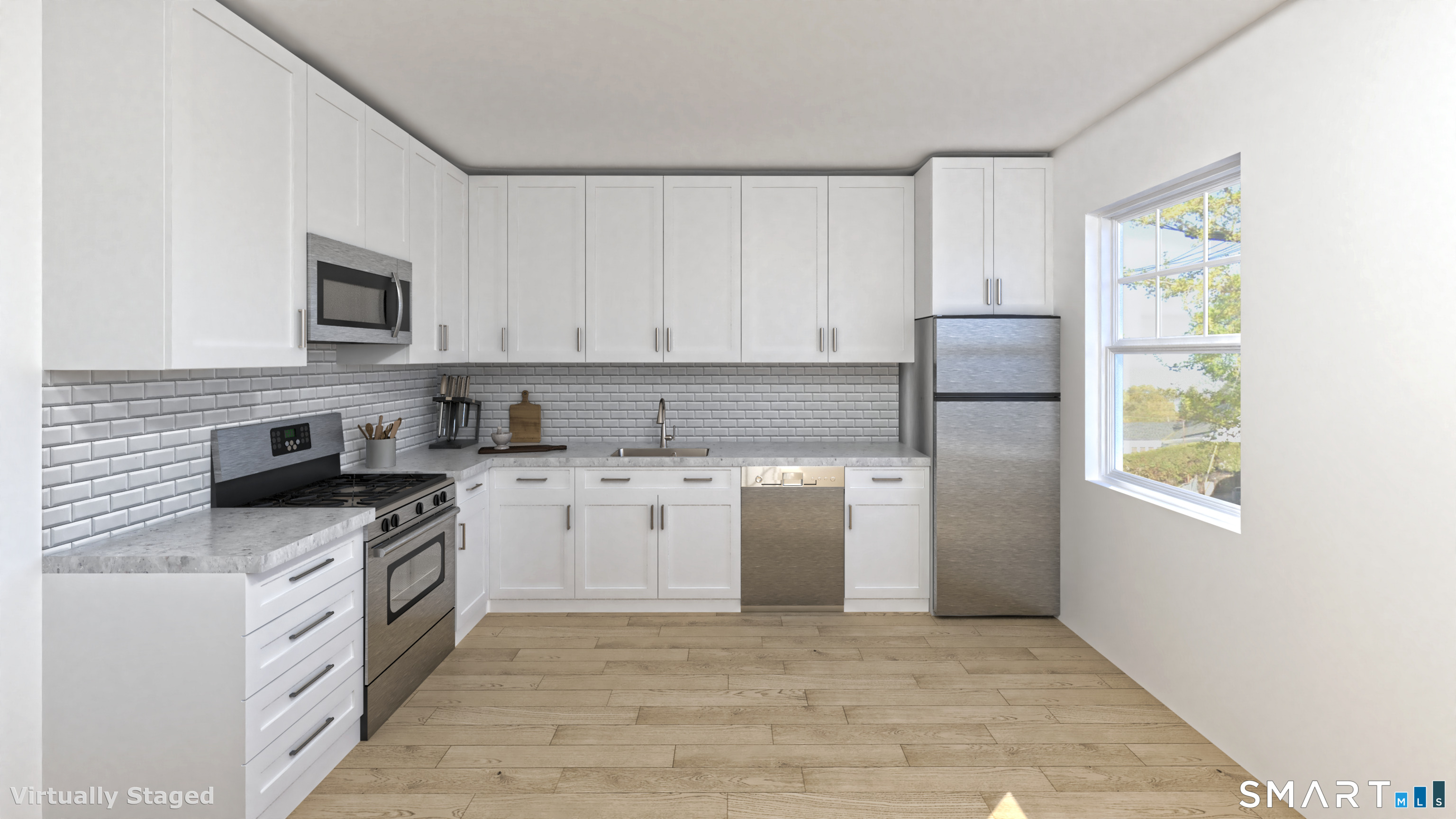 3589 Main Street Stratford, CT 06614 - Photo 2 of 3 a kitchen with stainless steel appliances granite countertop a stove a sink and a refrigerator
