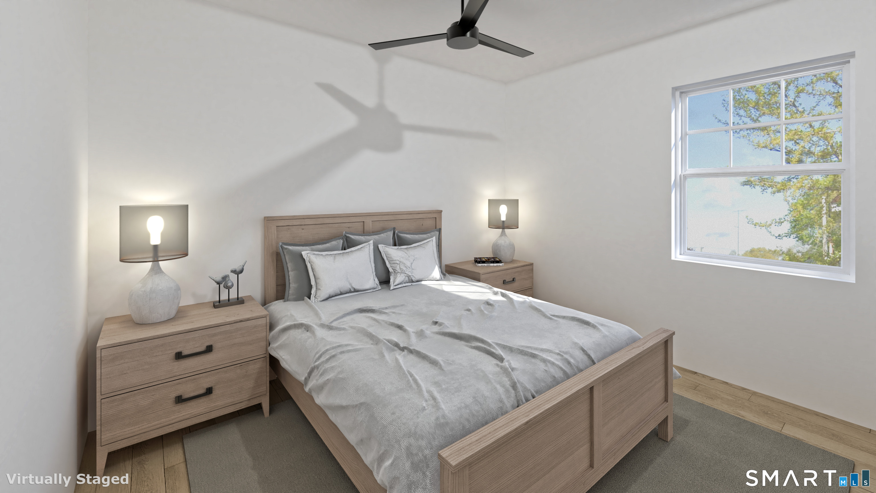 3589 Main Street Stratford, CT 06614 - Photo 3 of 3 a bedroom with a bed and a window