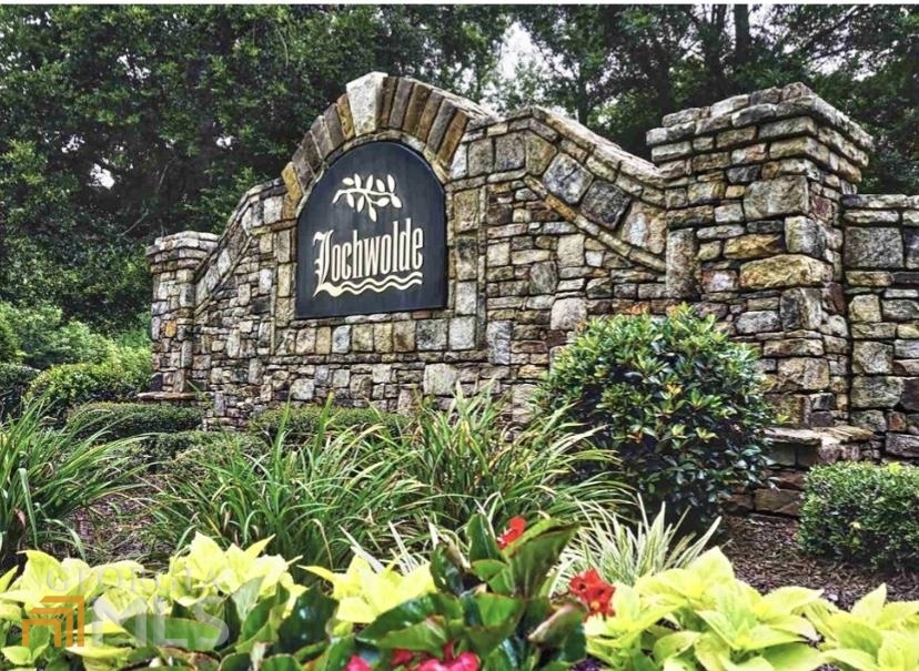 a large building with a clock on the top of it