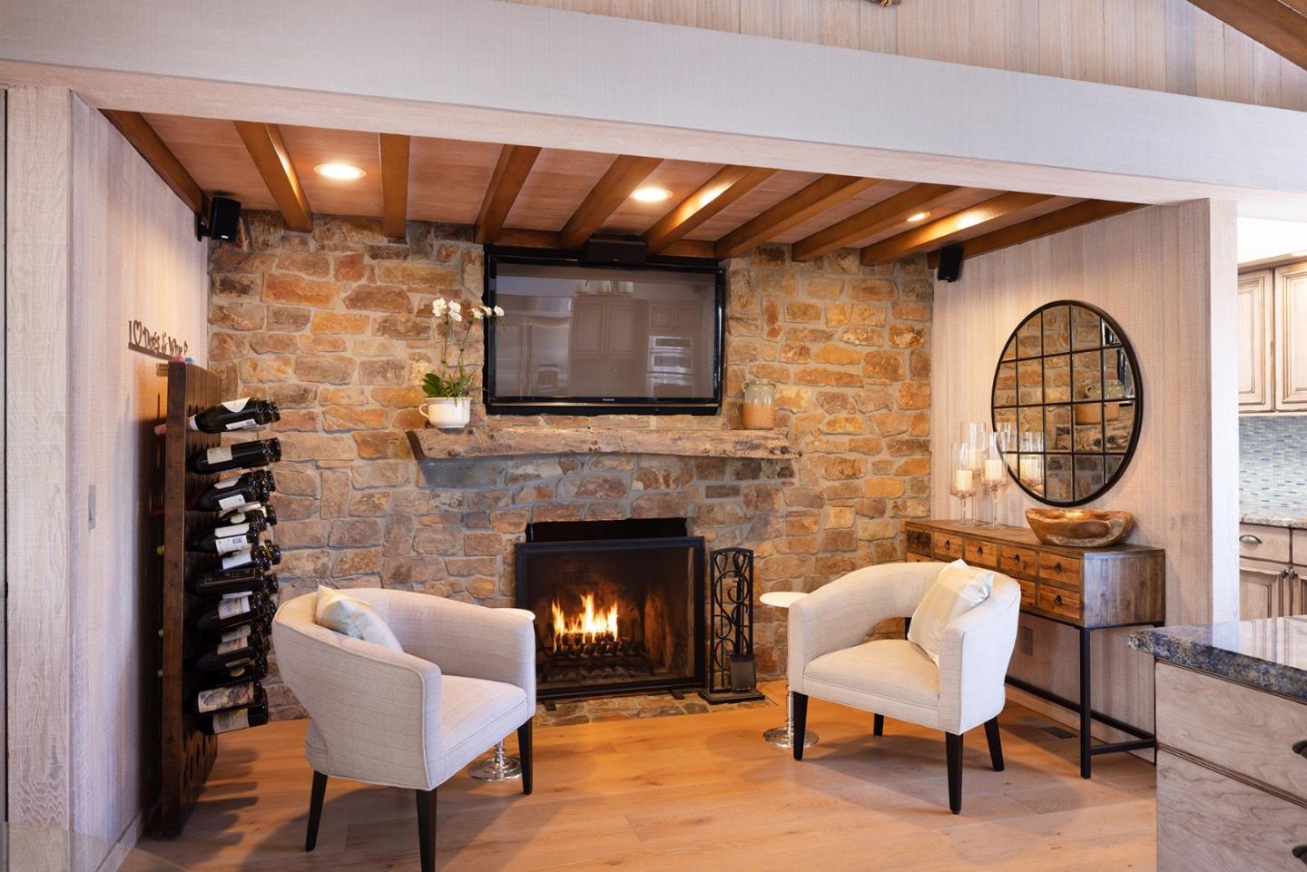 3893 Ronda Road Pebble Beach, CA 93953 - Photo 16 of 48 a living room with furniture and a fireplace