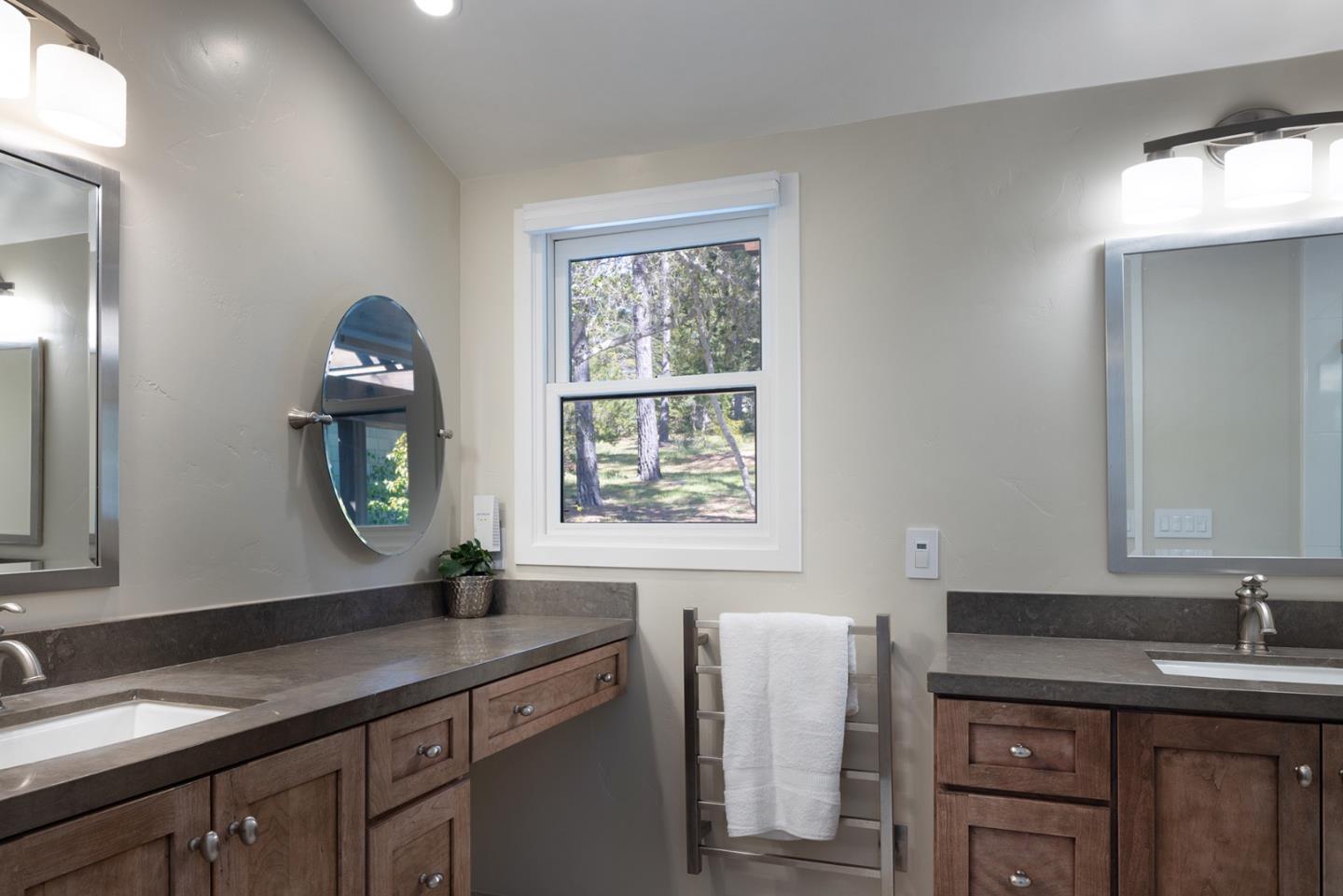 3893 Ronda Road Pebble Beach, CA 93953 - Photo 28 of 48 a kitchen with a sink cabinets and window