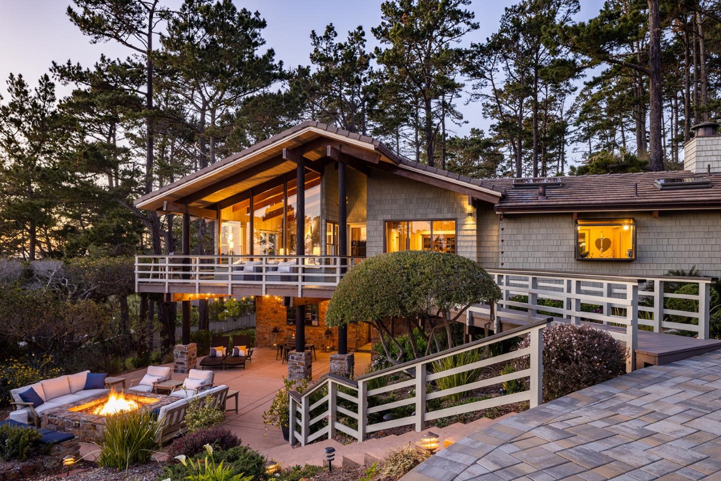 3893 Ronda Road Pebble Beach, CA 93953 - Photo 3 of 48 a backyard of a house with barbeque oven table and chairs