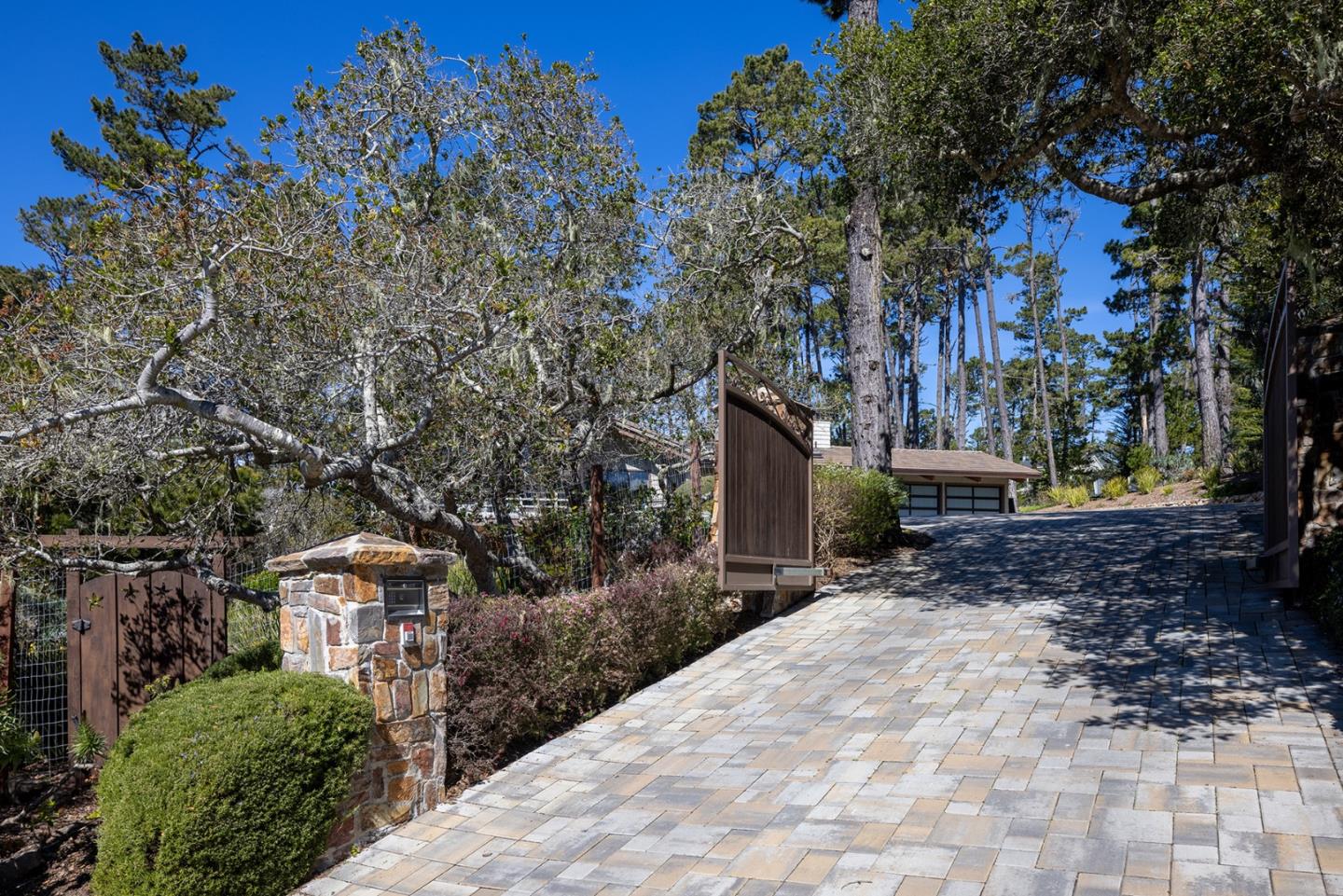 3893 Ronda Road Pebble Beach, CA 93953 - Photo 48 of 48 a pathway of a house with a yard