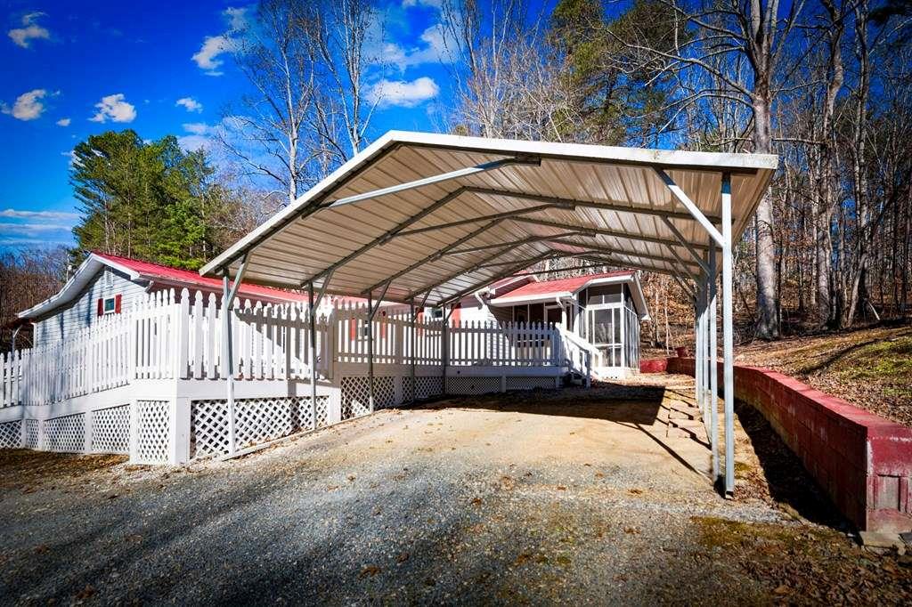 118 Jordan Road Blairsville, GA 30512 - Photo 41 of 49 a view of a house with a roof deck