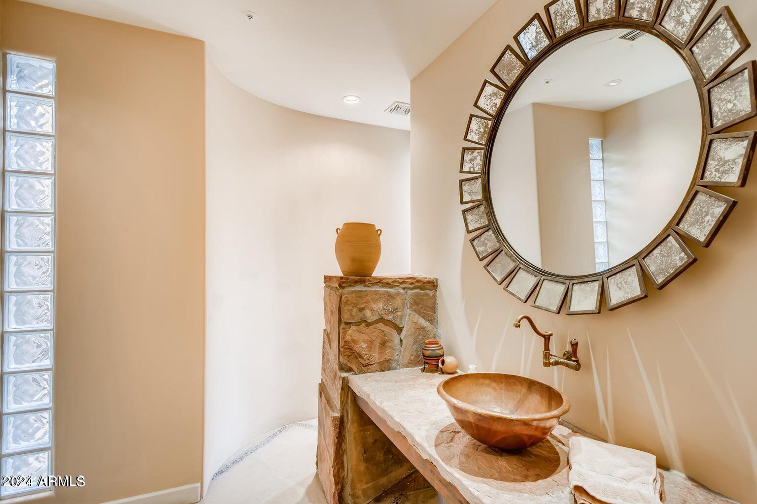 7475 East Gainey Ranch Road, Unit 26 Scottsdale, AZ 85258 - Photo 14 of 25 Powder Room Downstairs