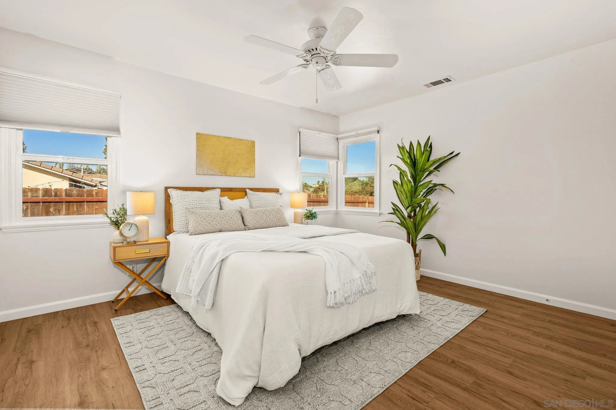 1395 Summit Avenue Cardiff, CA 92007 - Photo 21 of 47 a bedroom with bed and a window