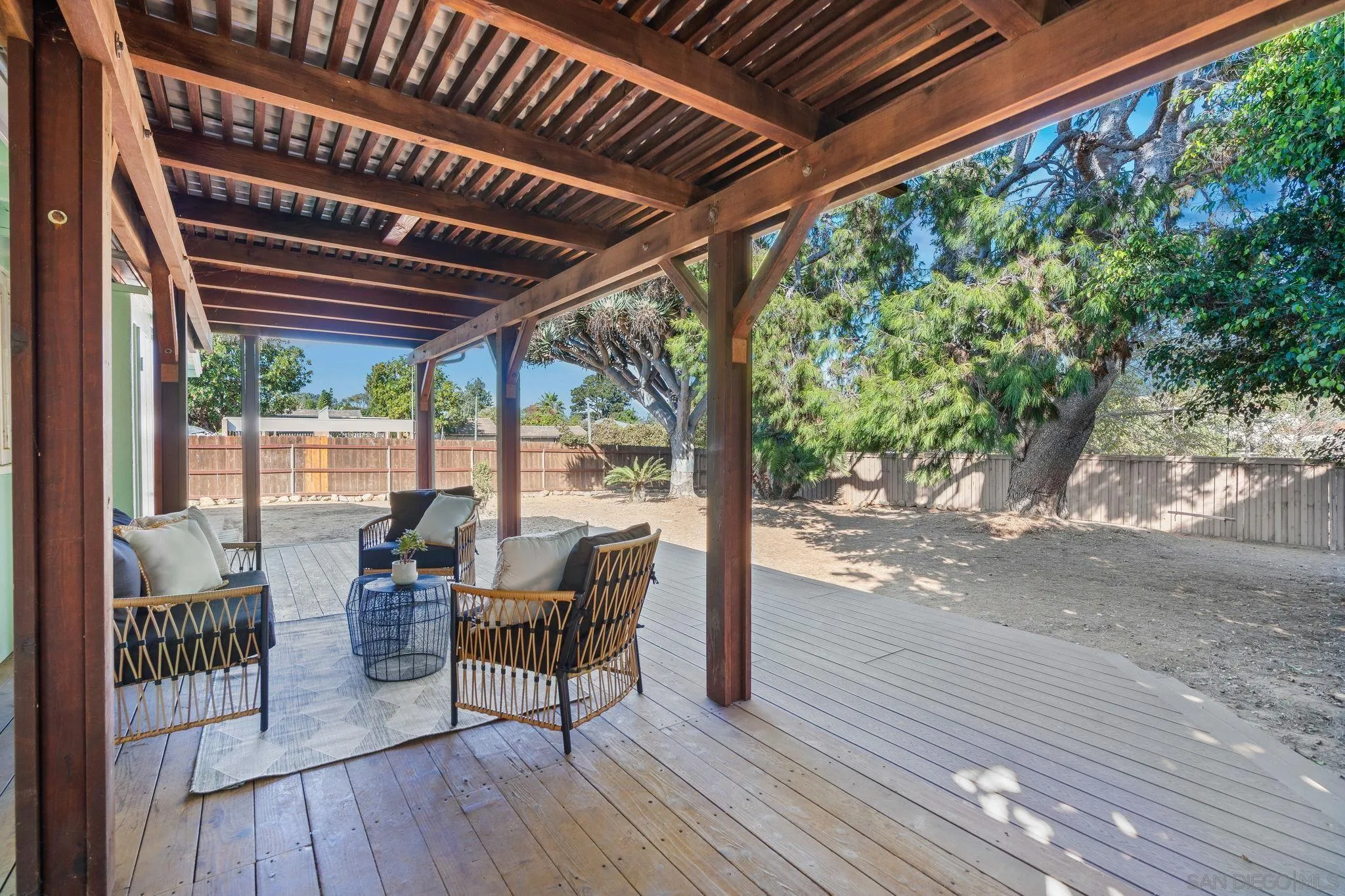 1395 Summit Avenue Cardiff, CA 92007 - Photo 27 of 47 a view of a porch with furniture and wooden floor