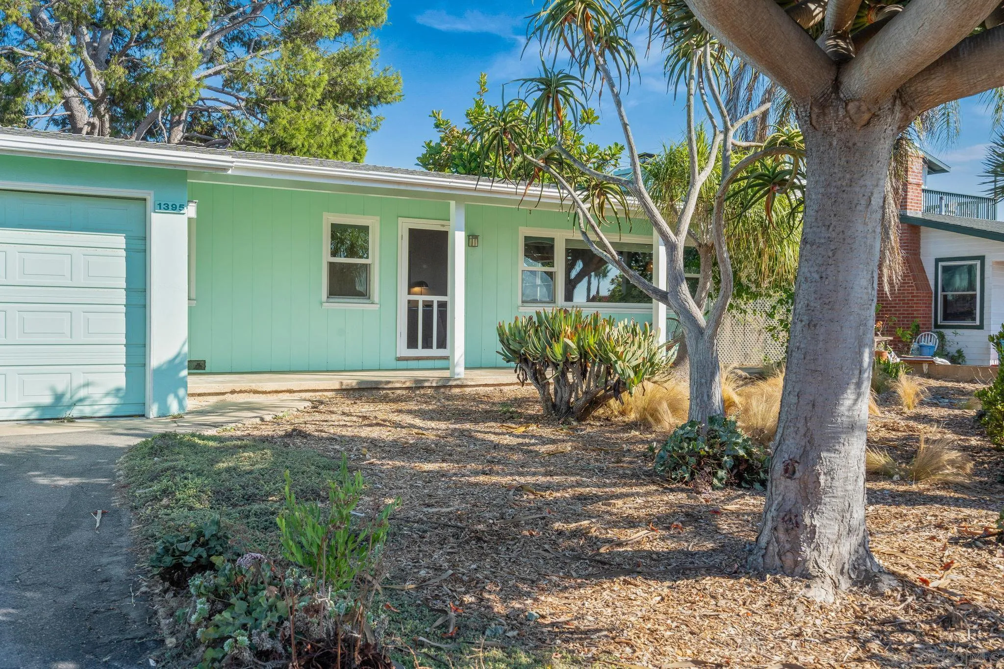 1395 Summit Avenue Cardiff, CA 92007 - Photo 31 of 47 a front view of a house with garden