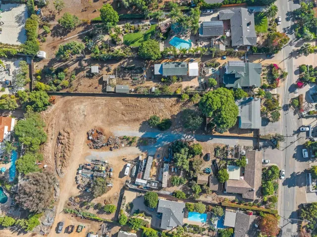 an aerial view of a house with a garden