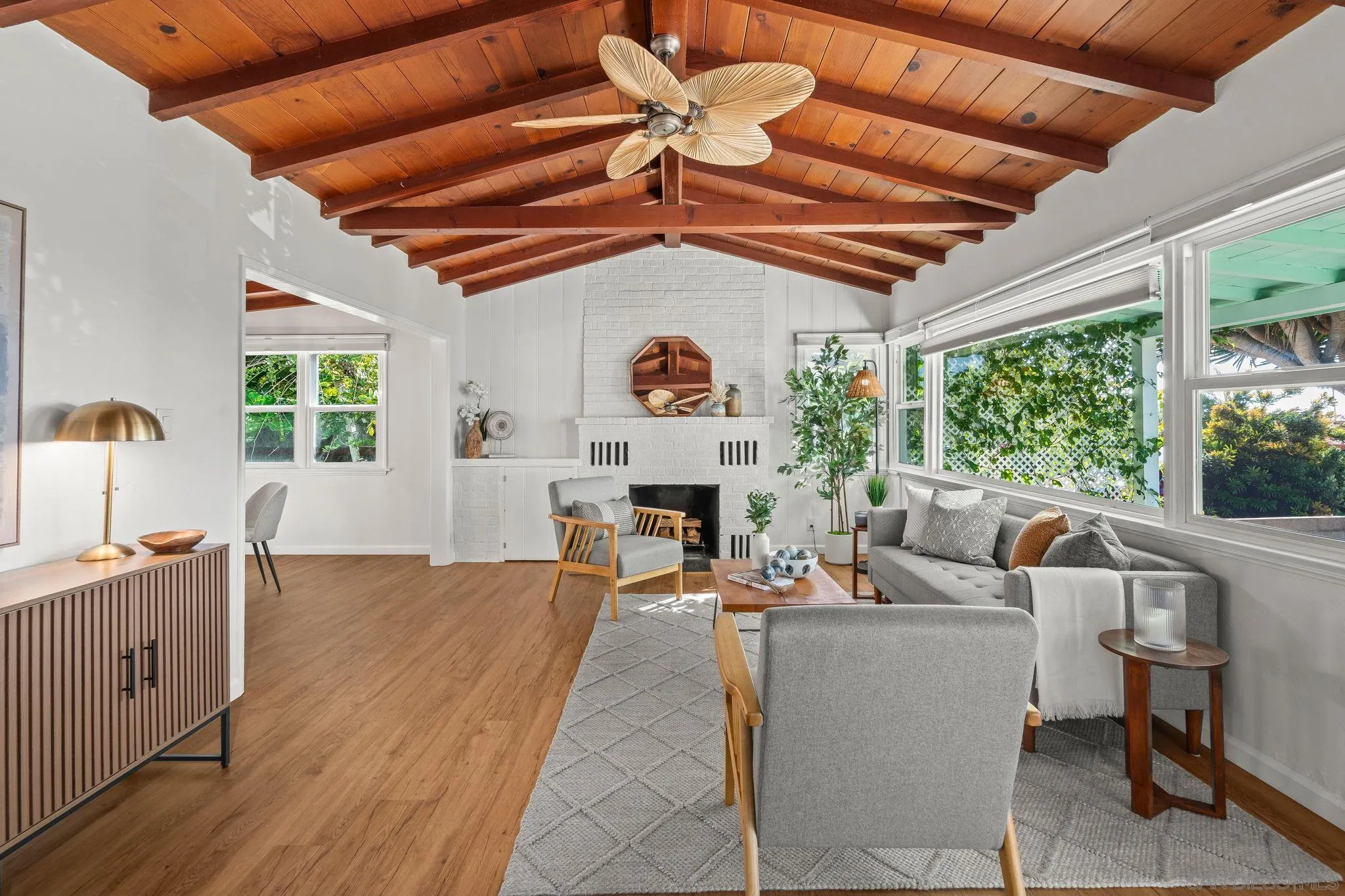 1395 Summit Avenue Cardiff, CA 92007 - Photo 5 of 47 a living room with fireplace furniture and a large window
