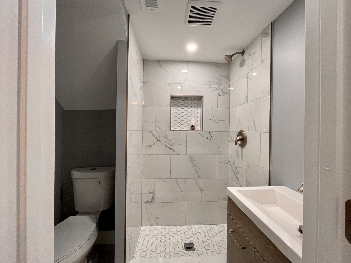 541 Spruce Road Bolingbrook, IL 60440 - Photo 15 of 21 a bathroom with a sink toilet and shower