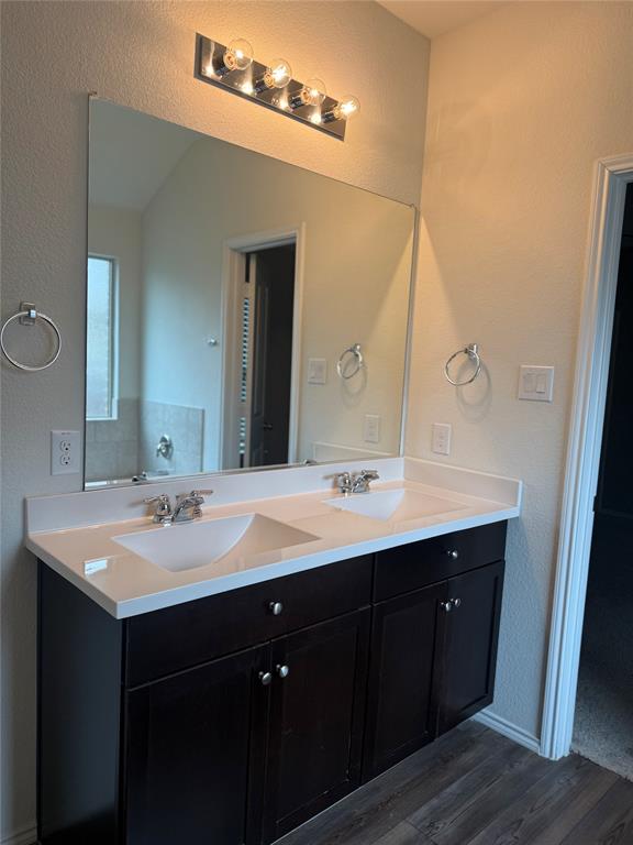 1004 Rising Moon Drive Fort Worth, TX 76052 - Photo 11 of 13 Dual vanity with a white countertop and integrated sinks
