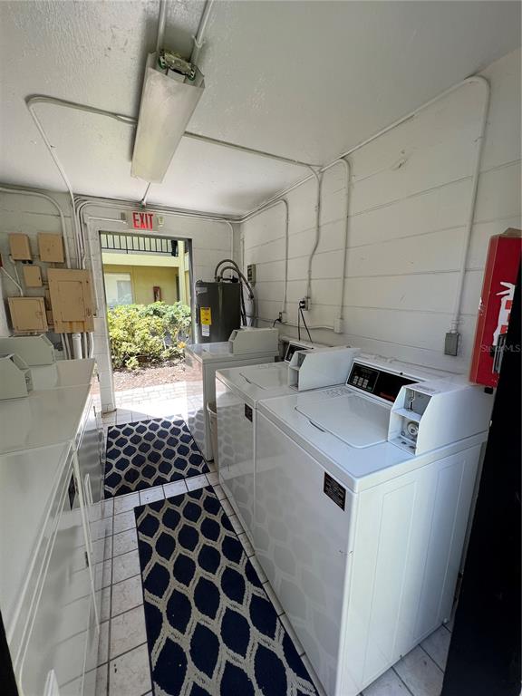 3206 West Azeele Street, Unit 100 Tampa, FL 33609 - Photo 14 of 15 a utility room with dryer and washer