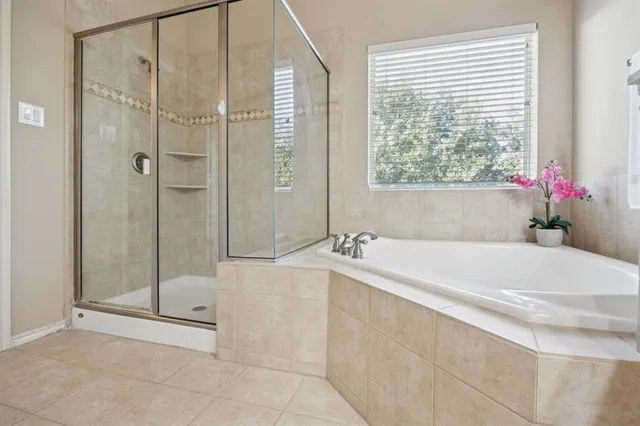 a view of storage and utility room with closet