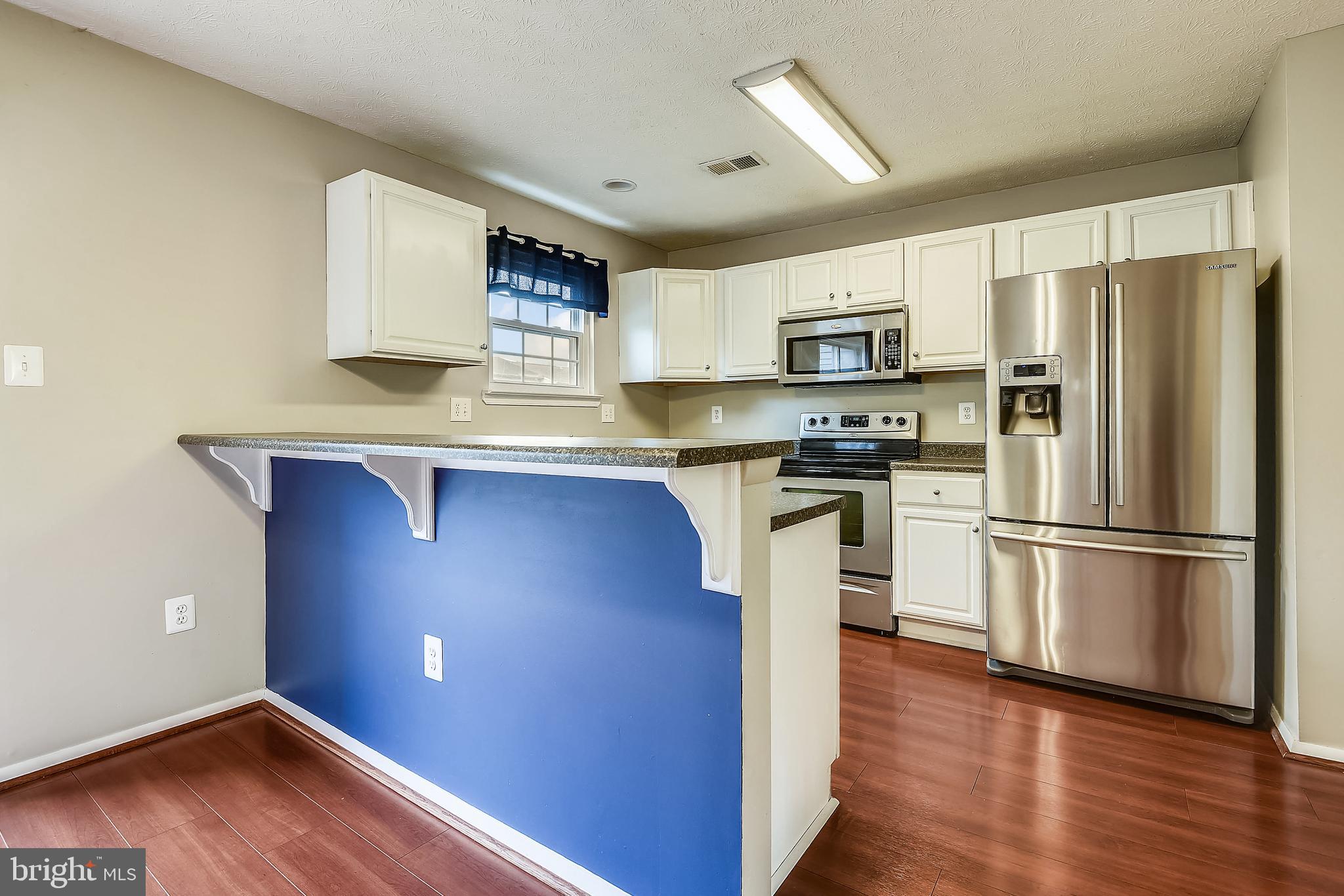 366 Rambling Ridge Court Pasadena, MD 21122 - Photo 2 of 32 Beautiful bright kitchen with breakfast area
