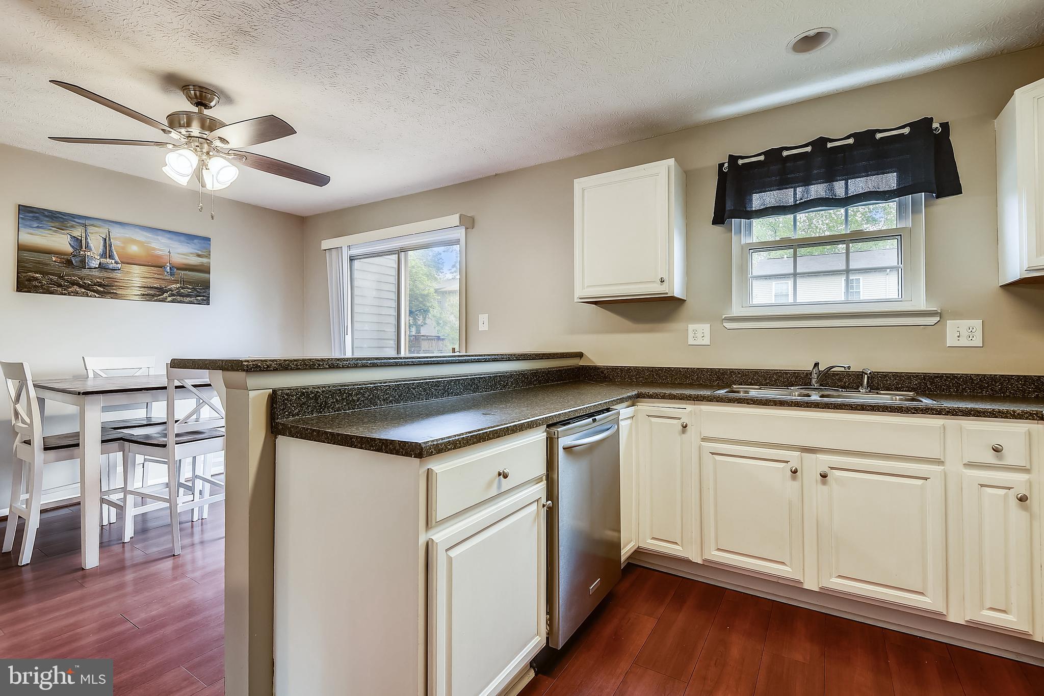 366 Rambling Ridge Court Pasadena, MD 21122 - Photo 3 of 32 Bright, open kitchen with easy access to deck