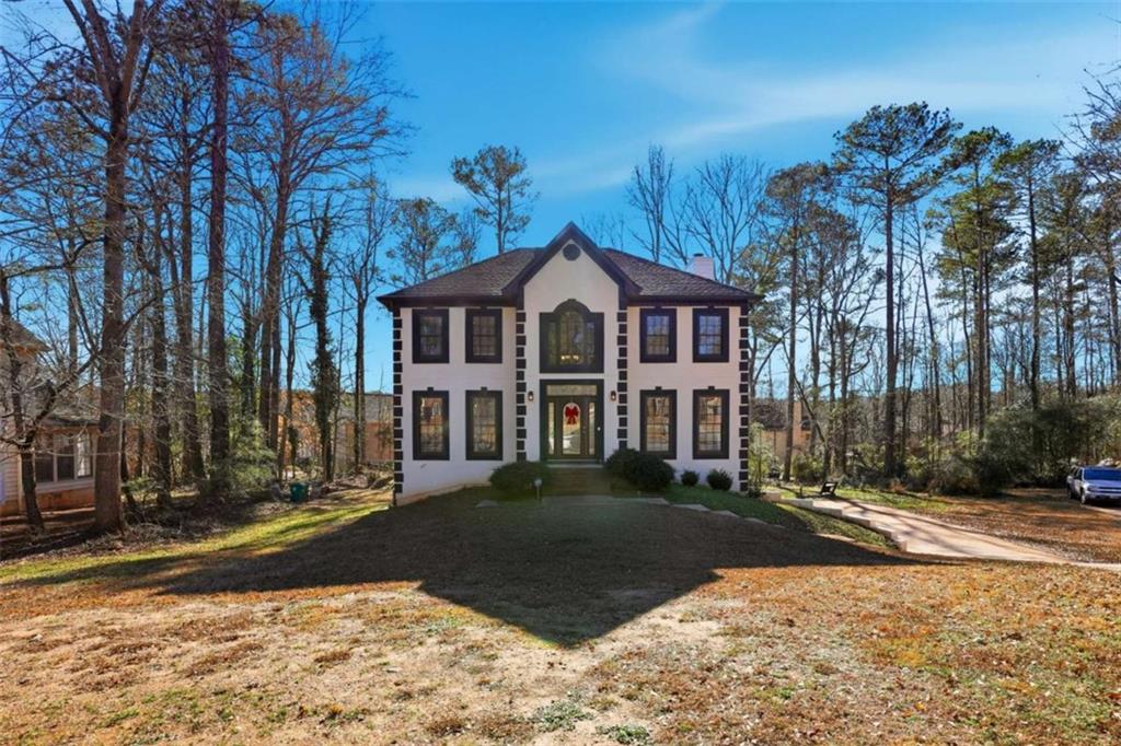 3811 Brookvale Place Decatur, GA 30034 - Photo 1 of 40 a front view of a house with a yard