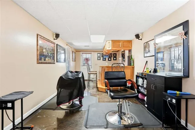 a room with furniture and wooden floor