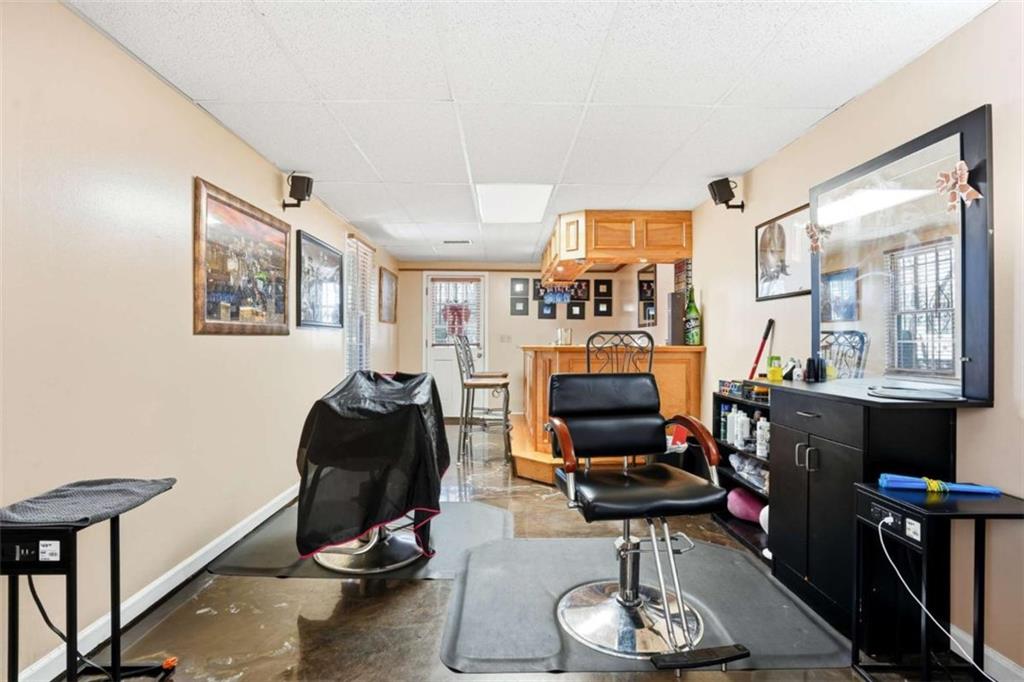 3811 Brookvale Place Decatur, GA 30034 - Photo 32 of 40 a room with furniture and wooden floor