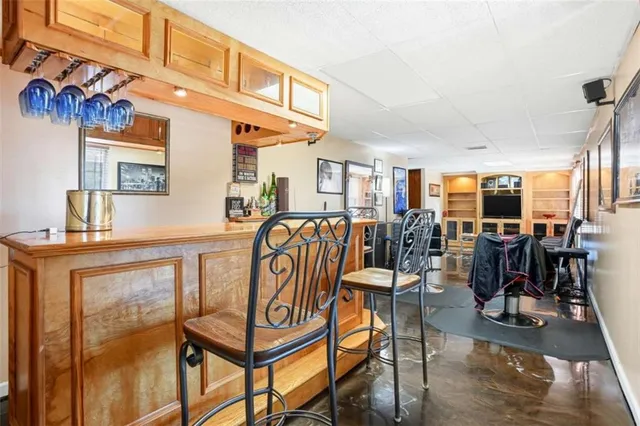 a view of a chairs and table in a room