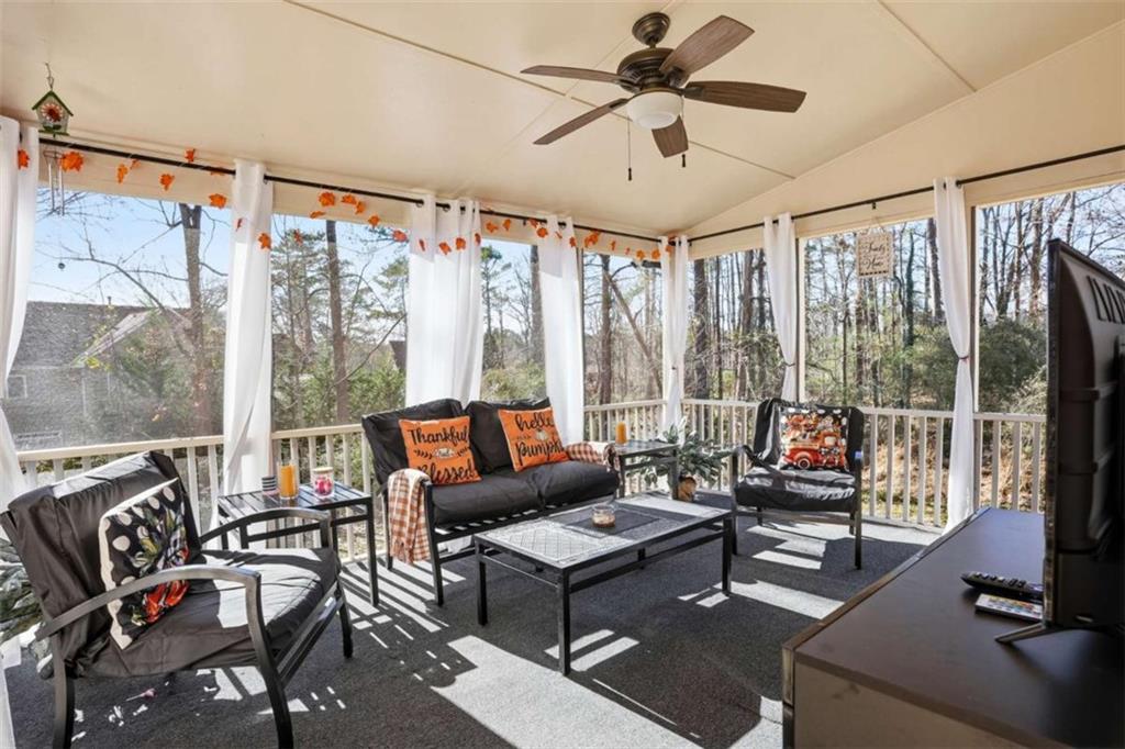 3811 Brookvale Place Decatur, GA 30034 - Photo 35 of 40 a living room with furniture and a flat screen tv