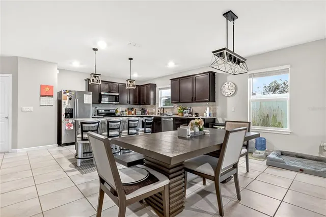 a view of a dining room with furniture