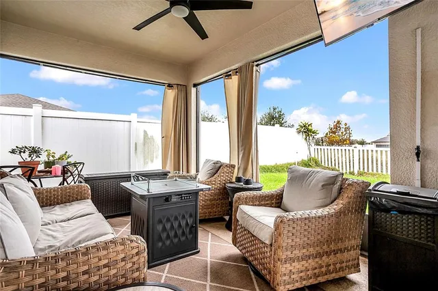 a living room with furniture and a window