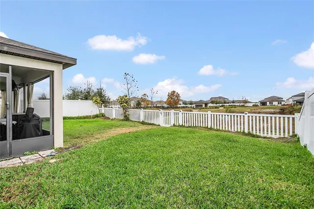 a view of a garden with a houses