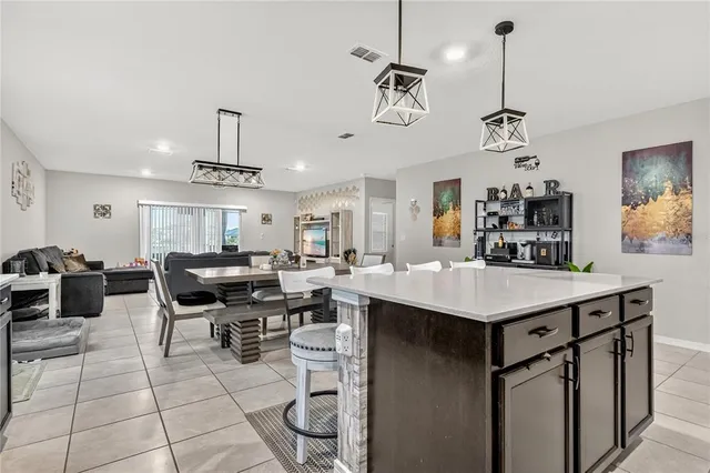 a kitchen with a sink a counter space and appliances