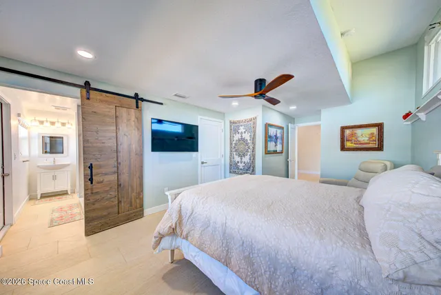 a bathroom with a shower and a toilet