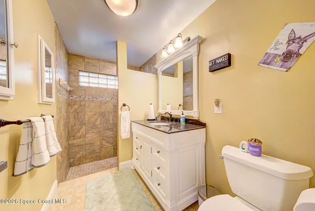 a view of storage and utility room with washer and dryer