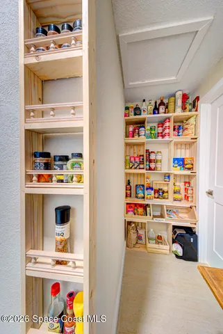 a workspace with furniture and a book shelf
