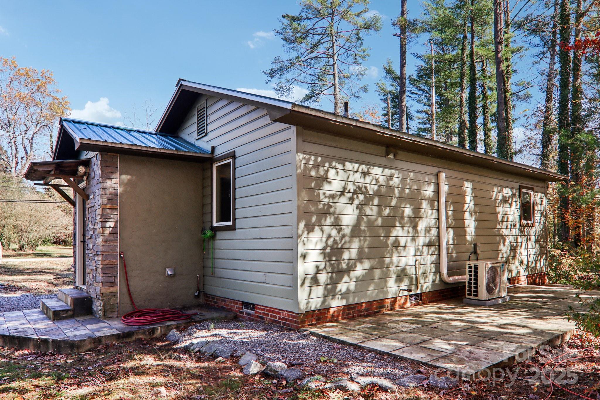1749 Haywood Road Hendersonville, NC 28791 - Photo 46 of 48 a view of a house with a door