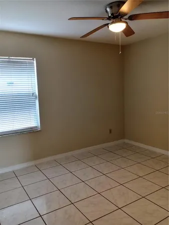 a bathroom with a toilet bathtub and shower
