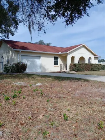 a house view with a garden space