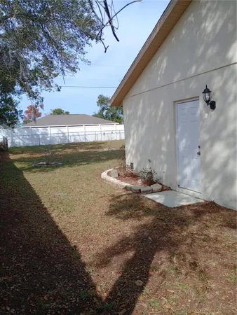 a view of yard with ocean view