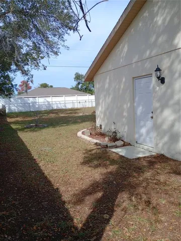 a view of yard with ocean view