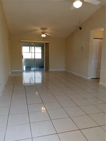 a view of an empty room and window