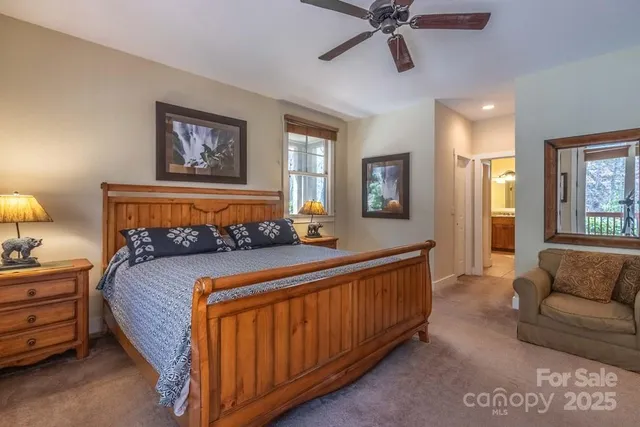 a bedroom with bed and window