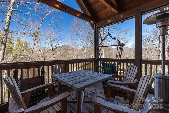 a view of a balcony with wooden floor